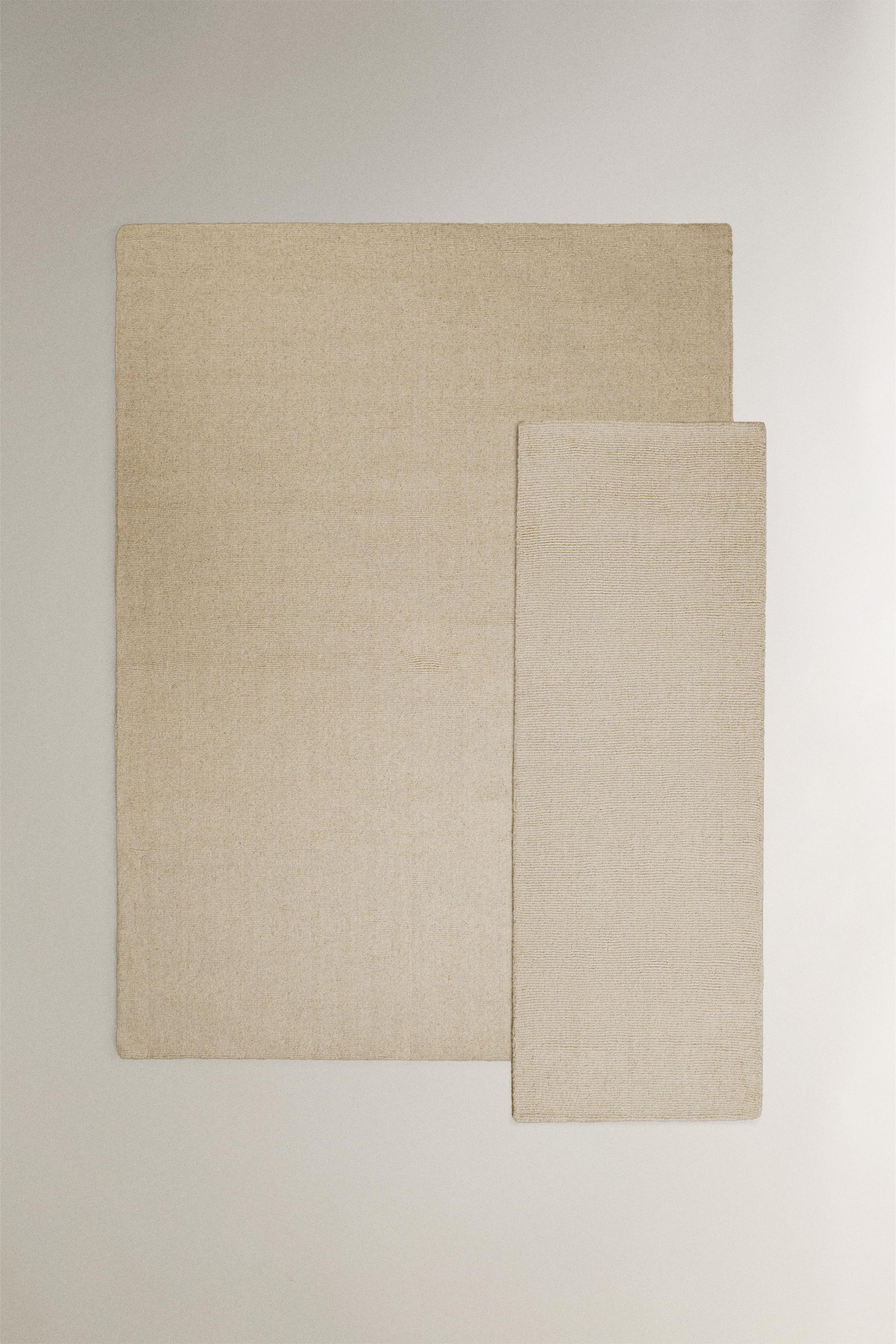 WOOL AREA RUG WITH LOOPS